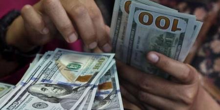 تراجع الدولار مع إظهار محضر الفيدرالي انقساماً حول مسار الفائدة